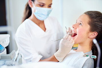 Girl, child and dental inspection at dentist with healthcare tool, consultation and safety mask for...