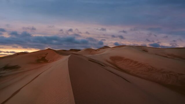 Timelapse of sunset over the sand dunes in the desert. Death Valley