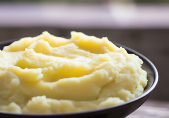 Close up of bowl of mashed potatoes - 770614950