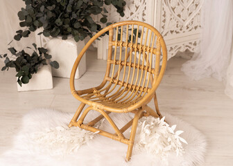 a small vintage wooden chair for a toddler photo session in a photo studio