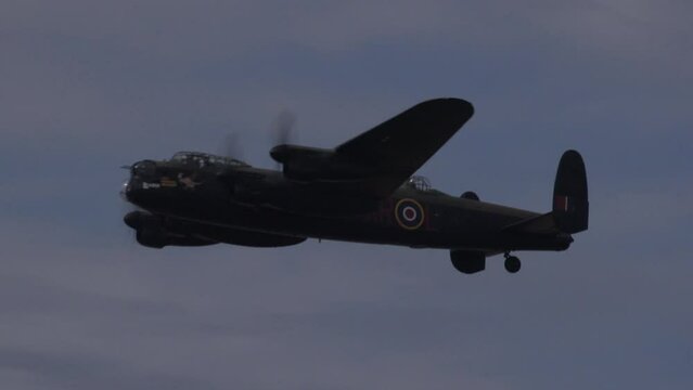 Avro Lancaster bomber world war 2 plane spitfire and Hawker Hunter in formation in the sky. Flying close to camera England UK 4K