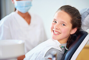 Dental, smile or portrait of girl with dentist in consultation room for mouth, gum or wellness. Cleaning, teeth whitening or kid consulting orthodontist for tooth, growth or braces and development
