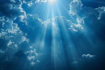 A clear sky dotted with fluffy white clouds. The sunlight filters through the clouds, casting a warm glow over the landscape. The scene radiates tranquility and serenity.