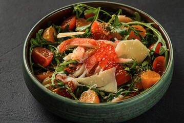 salad with crab arugula and red caviar