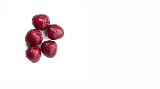 fruit known as pink jambo on isolated white background. Syzygium jambos Alston