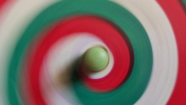 A Hypnotic Pendulum background. The rotation of the Bundle. Vestibular apparatus training. Psychedelic horizontal video backdrop. 