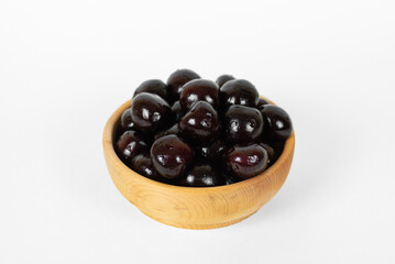 wooden cup with cherries