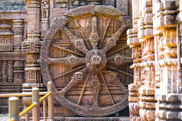 Antique sun wheel depicting chariot and sundial of sun emple at Konark odisha, India
