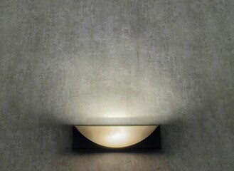 white light bulb on the wall facing up