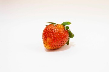 Closeup of a red strawberry isolated on a white background