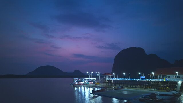 Time lapse Panyee island in twilight The village itself is a small but charming island village that has a lot to offer.
Koh Panyee is another tourist attraction in Phang Nga Province.Football field