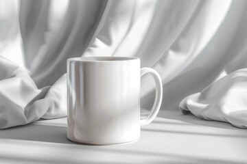 A solitary white mug is bathed in the soft shadows of sumptuous white silk fabric, symbolizing solitude and peace
