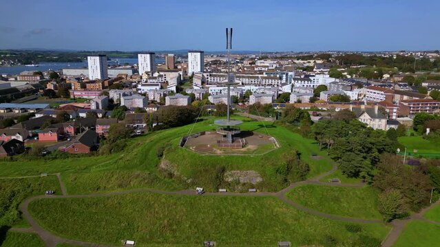 Ascending drone footage of Mount Wise Observation Tower and Mount Wise Pools in Plymouth, UK