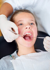 Girl, kid and mouth inspection at dentist for healthcare with dental tool, consultation or checkup for oral health. Expert, child patient and glove hand for teeth cleaning, gingivitis or medical care
