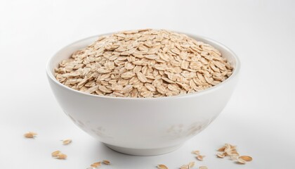 Dry rolled oatmeal in bowl isolated on white background