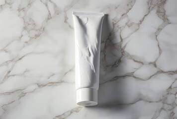 A tube of skin care product rests on a marble white background, its opaque resin panels, heavy shading, orderly arrangements, and recycled nature forming monochromatic white figures.