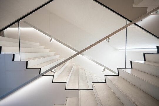 Elegant, winding staircase in Fondazione Prada Milano, designed by OMA