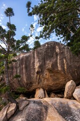 Rocks in Arcadia on Magnetic Island in Townsville, Australia surrounded by trees - obrazy, fototapety, plakaty