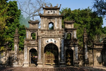 Fototapeta na wymiar Stunning view of an ancient gateway and wall at the Thien Tru Buddhist Temple.
