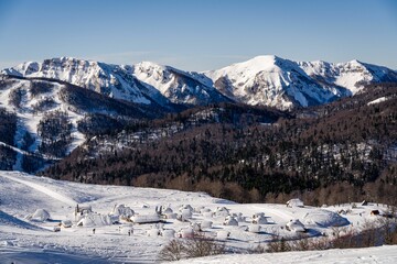 Fototapeta na wymiar Picturesque scene of a group of majestic mountains covered in snow, Montenegro