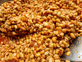 Soybeans with the Latin name Glycine max are processed into a spicy dish