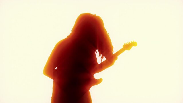 Head Banging Rock Guitar Player Backlit
