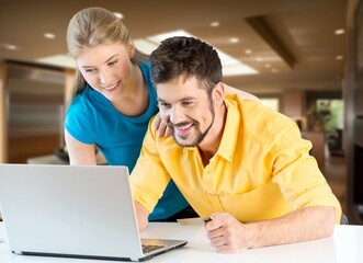 couple do financial planning with documents at home