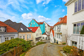 Street with wooden houses in old centre of Bergen, Norway - 770759939