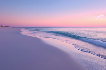 Peaceful dawn breaking over a serene beach, with gentle waves lapping at the pristine sand under a pastel sky.