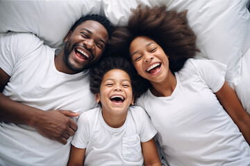 top view of family laughing in bed, generative ai - obrazy, fototapety, plakaty