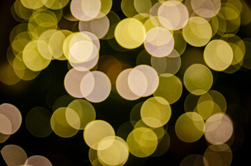 gold green bokeh with black background