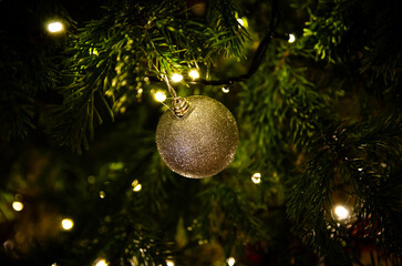 silver bauble on the Christmas tree