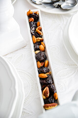 dried fruits and nuts in a white plate for Easter