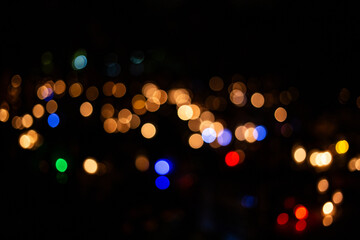 bokeh light from a torch on graves
