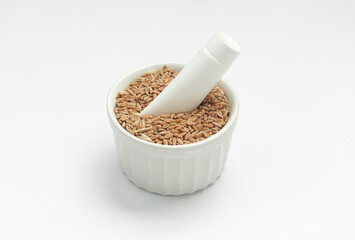 White cream tube with wheat grains on a white background. Natural cosmetics concept. Mockup for design