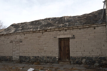 Image shows construction characteristics of a building in a remote village in Bolivia that uses...