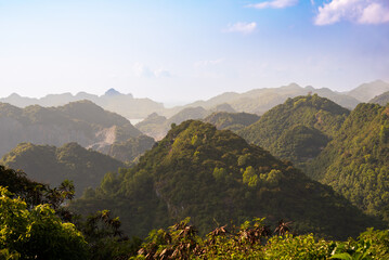 Green mountains covered with tropical rainforest in Vietnam