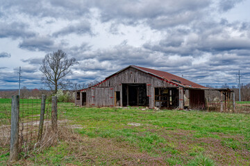 Abandoned barn and farmland
