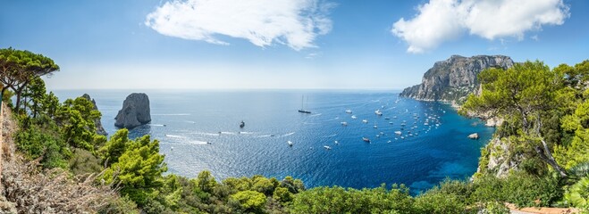 Capri island in summer seen from Belvedere di Tragara, Gulf of Naples, Campania, Italy