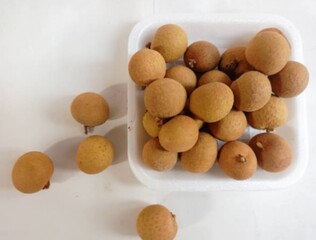 longan isolated on a white background - exotic fruit