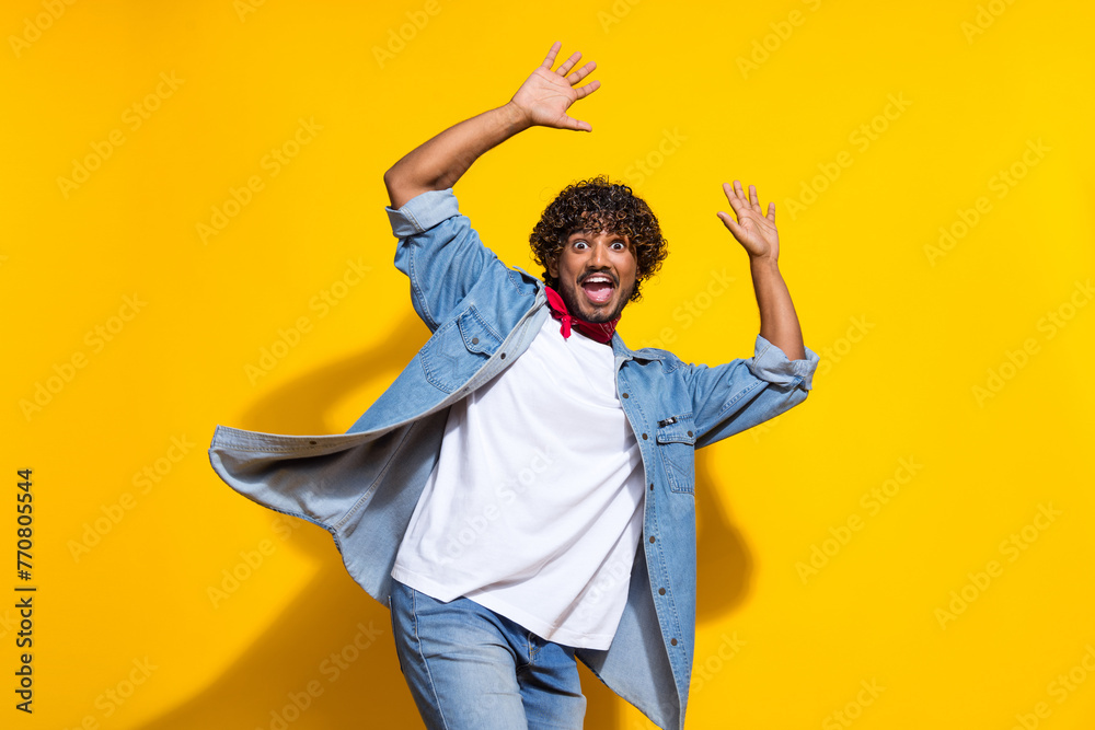 Wall mural photo portrait of nice young male raise hands excited dance dressed stylish denim outfit red scarf i