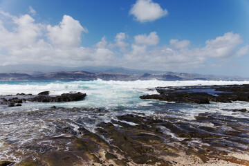 Fototapeta na wymiar Gran Canaria, view to El Confital beach on the edge of Las Palmas de Gran Canaria, large waves