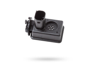 Close-up of a spare part for an air quality sensor car for replacement during repair or for sale at an auto-parsing.