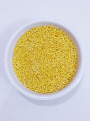 yellow lentil in a bowl
