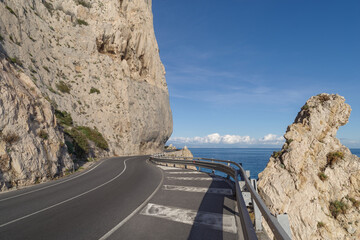 The stunning high altitude cliffside road along the coastline of Liguria, Italy - 770857119