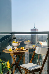 Vertical shot of balcony seating corner in luxury real estate - obrazy, fototapety, plakaty