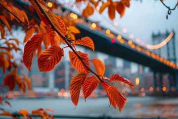 A view from across the water of a colorful autumn leaves and an iconic urban landmark bridge