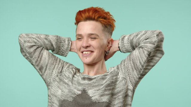 A refreshing morning stretch from a spirited young woman with fiery red hair, setting the tone for a positive and productive day ahead with her invigorating stretch. 