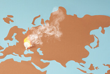 Ukraine location pin with fire and smoke.