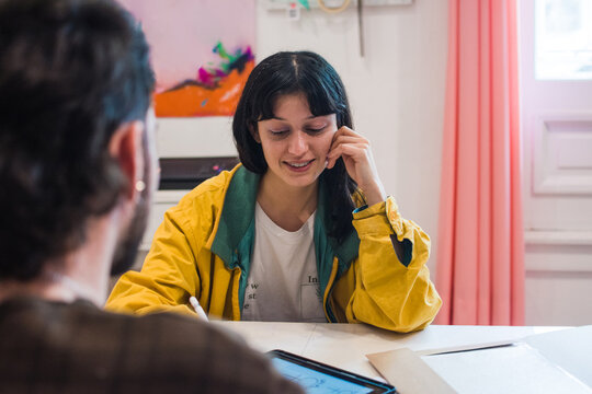 Artist reviewing job applicant portfolio